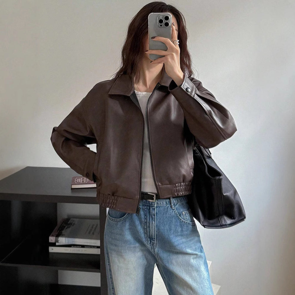 Damen Kunstlederjacke im sportlich-eleganten Schnitt mit elastischem Bund Heidi-Mode