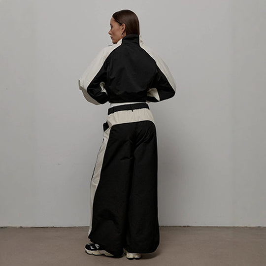 Damen sportliche Kapuzenjacke mit hohem Kragen und asymmetrischem Design Heidi-Mode