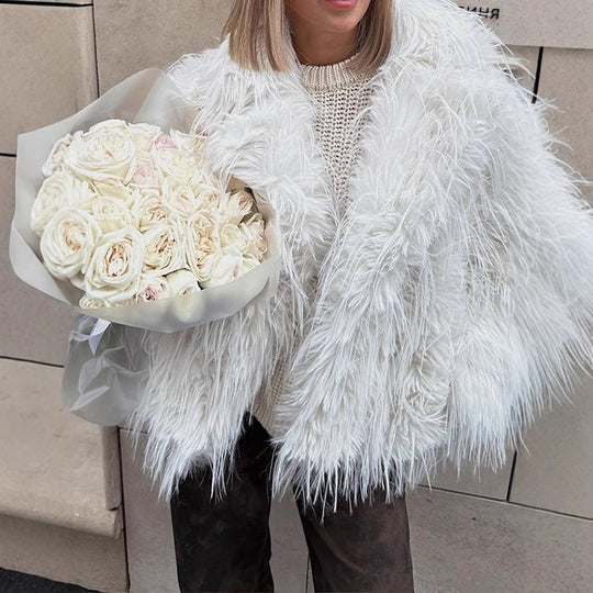 Damen Kunstfelljacke im extravagant gefransten Design Heidi-Mode