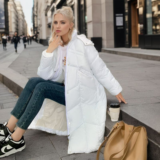 Damen lange isolierte Pufferjacke mit voluminösem Schnitt und praktischen Eingrifftaschen Heidi-Mode