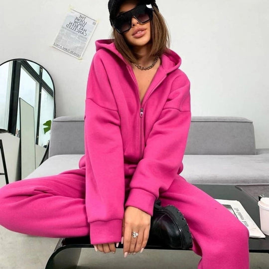 Damen Sportlicher Jumpsuit mit durchgehendem Reißverschluss und Kapuze Heidi-Mode