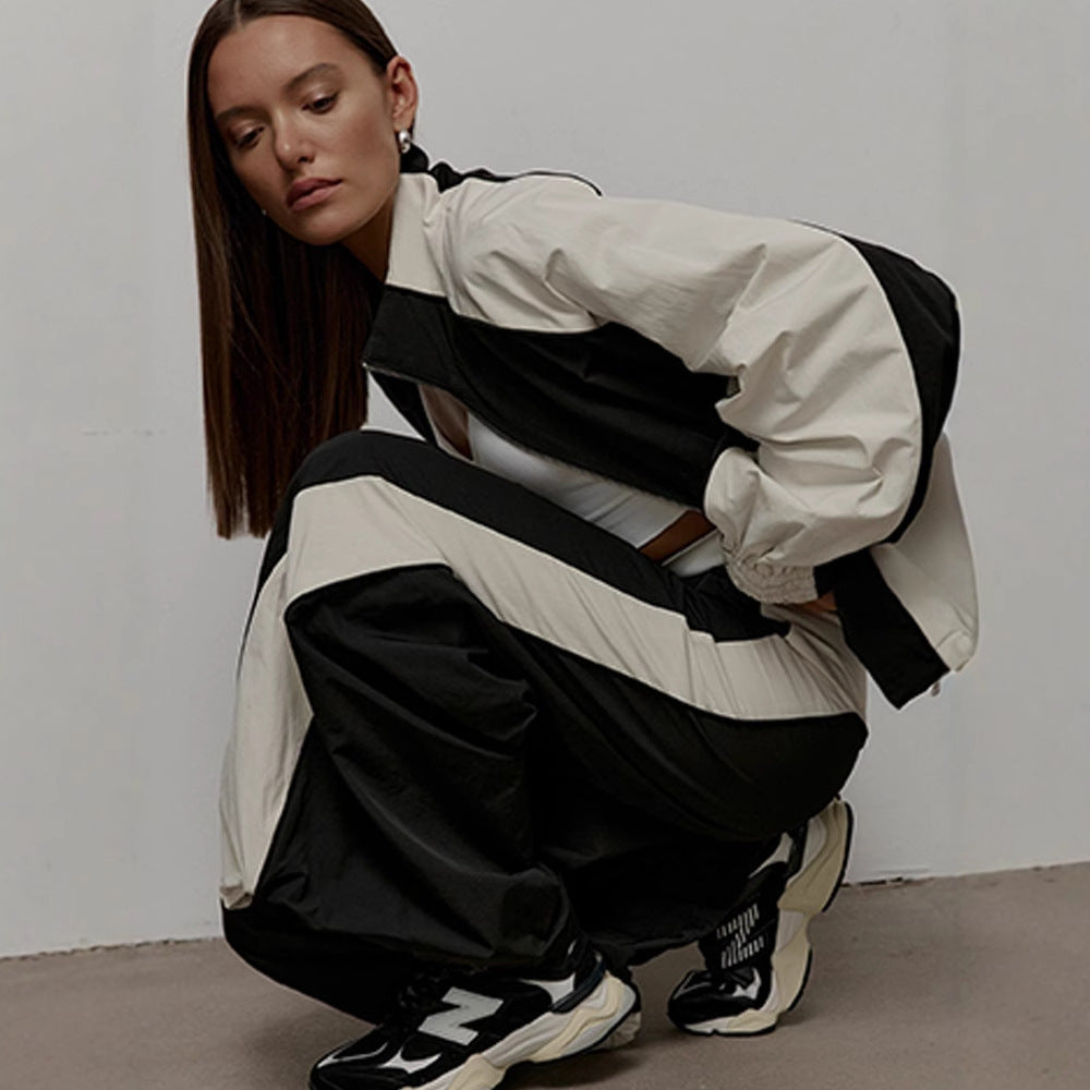 Damen sportliche Kapuzenjacke mit hohem Kragen und asymmetrischem Design Heidi-Mode