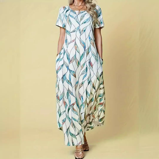 Damen Maxikleid mit elegantem Blattmuster und praktischen Taschen Heidi-Mode