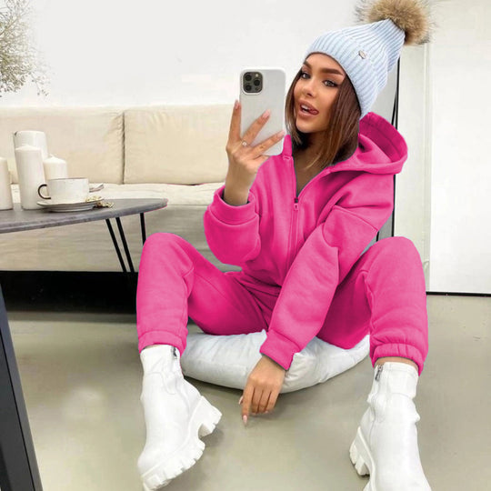 Damen Sportlicher Jumpsuit mit durchgehendem Reißverschluss und Kapuze Heidi-Mode