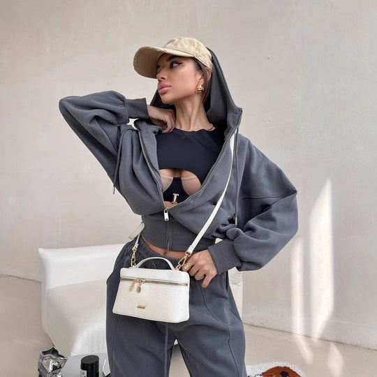 Damen sportliches Crop-Hoodie- und weite Jogginghose-Set mit modischen Akzenten Heidi-Mode