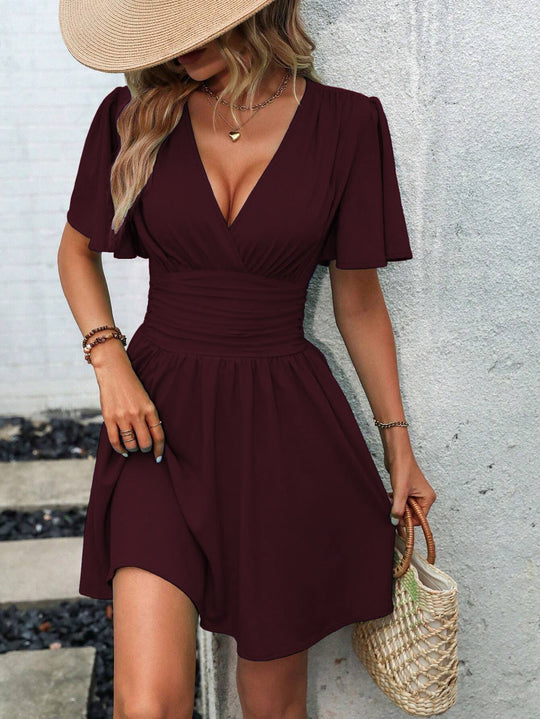 Damen Wickelkleid mit elegantem V-Ausschnitt und fließendem Saum Heidi-Mode