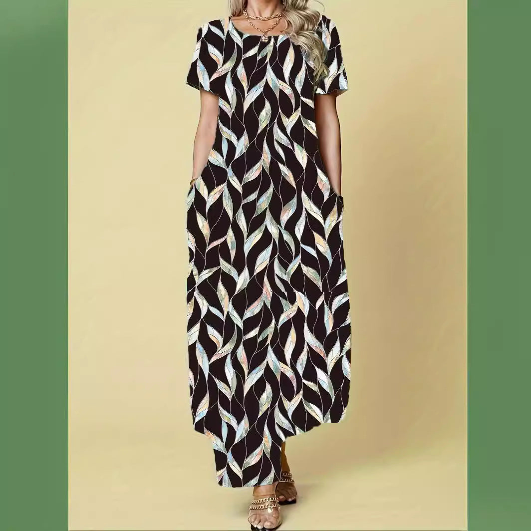 Damen Maxikleid mit elegantem Blattmuster und praktischen Taschen Heidi-Mode