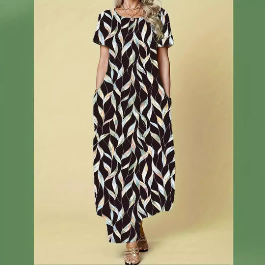 Damen Maxikleid mit elegantem Blattmuster und praktischen Taschen Heidi-Mode