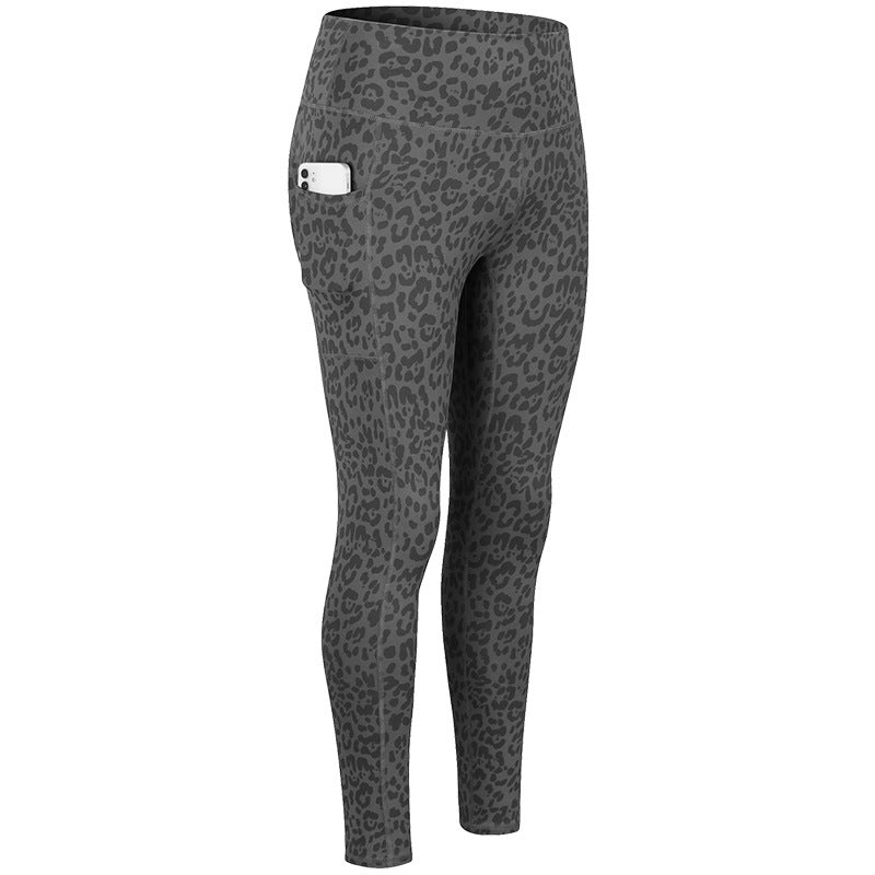 Damen Hochwertige Performance-Leggings mit praktischen Seitentaschen und elastischem Bund Heidi-Mode