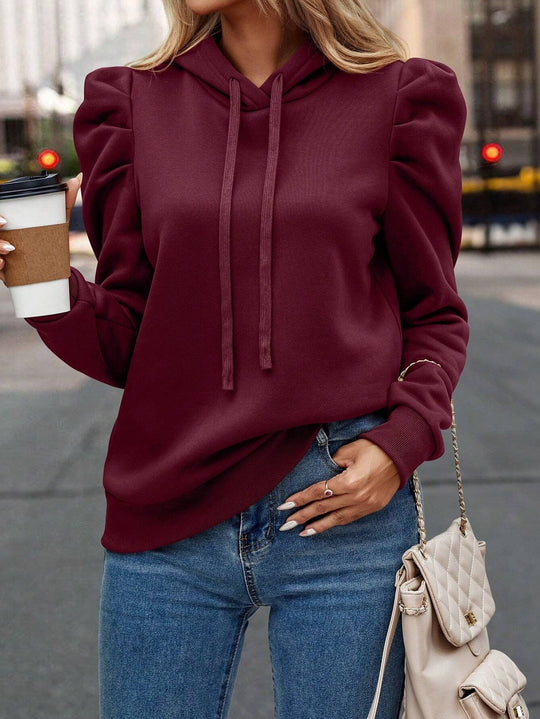 Damen lässiger Kapuzenpullover mit Puffärmeln Heidi-Mode