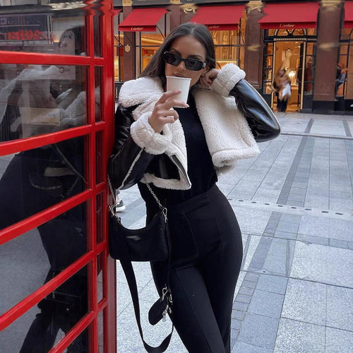 Damen Kunstfell-Bikerjacke mit gefüttertem Kragen und seitlichem Reißverschluss Heidi-Mode