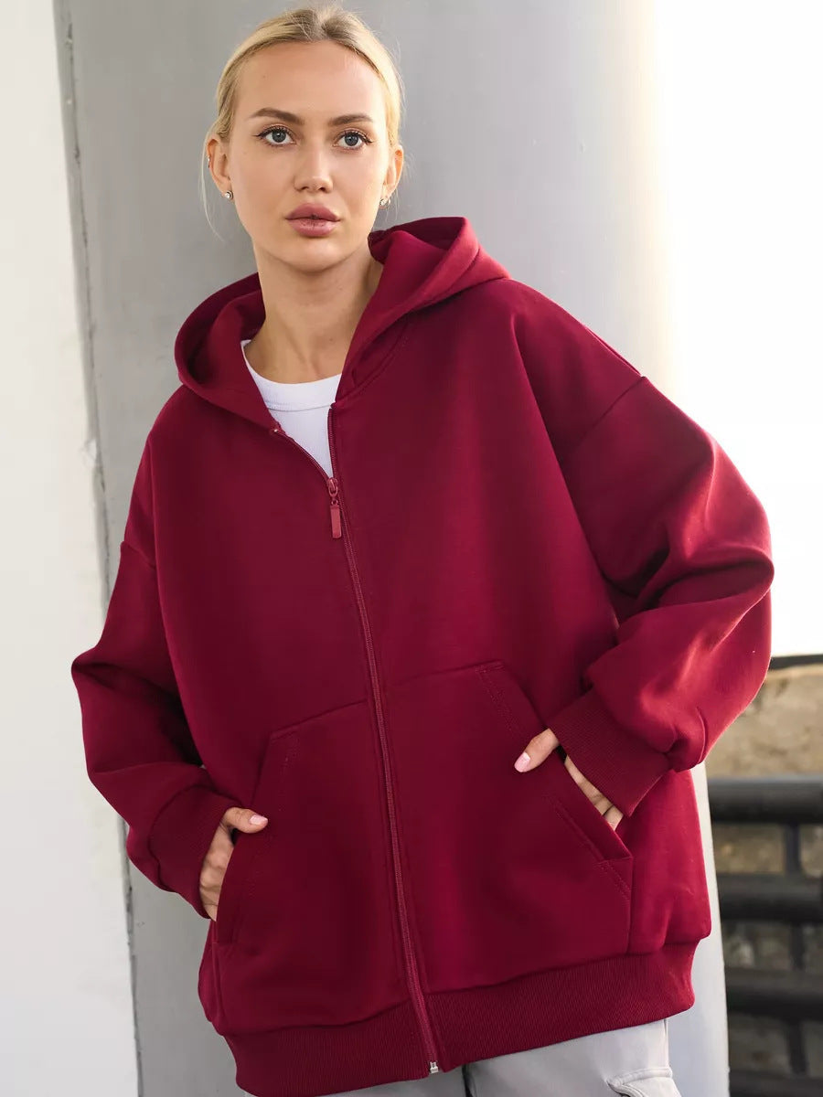 Damen oversized Kapuzenjacke mit durchgehendem Reißverschluss und großen Taschen Heidi-Mode