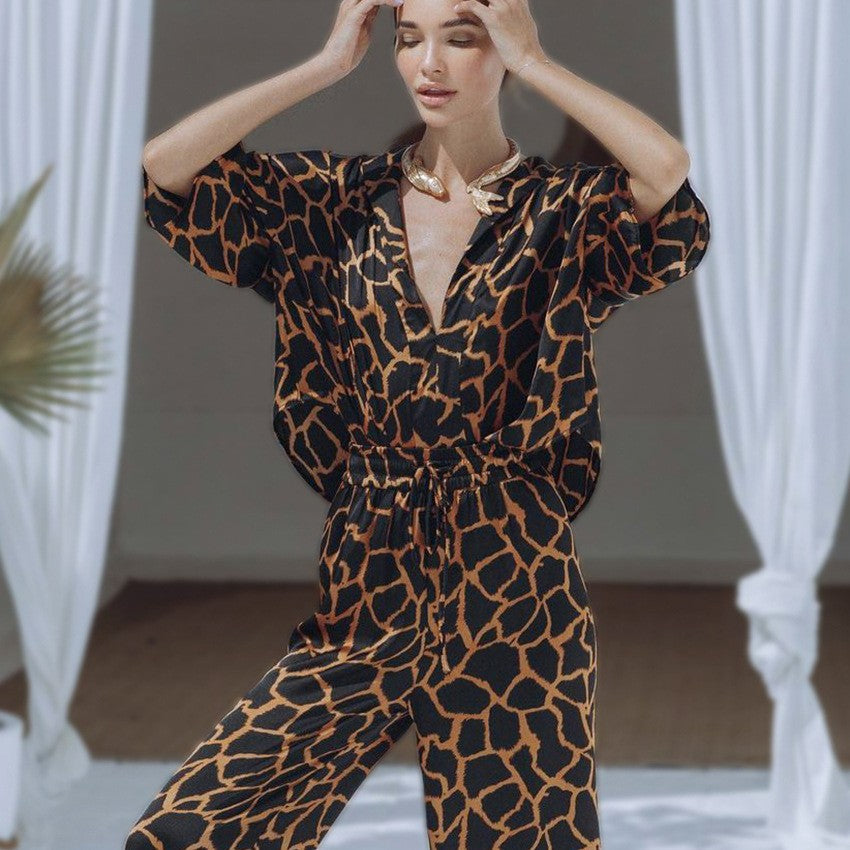 Damen Jumpsuit mit weit geschnittenen Beinen und elegantem Giraffenmuster Heidi-Mode