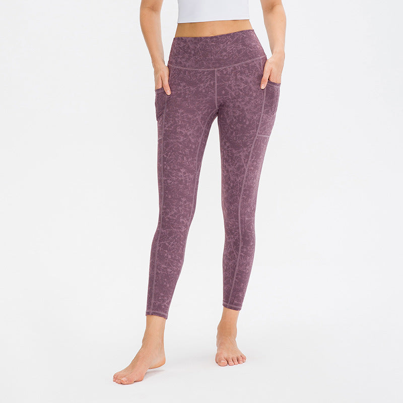 Damen Hochwertige Performance-Leggings mit praktischen Seitentaschen und elastischem Bund Heidi-Mode