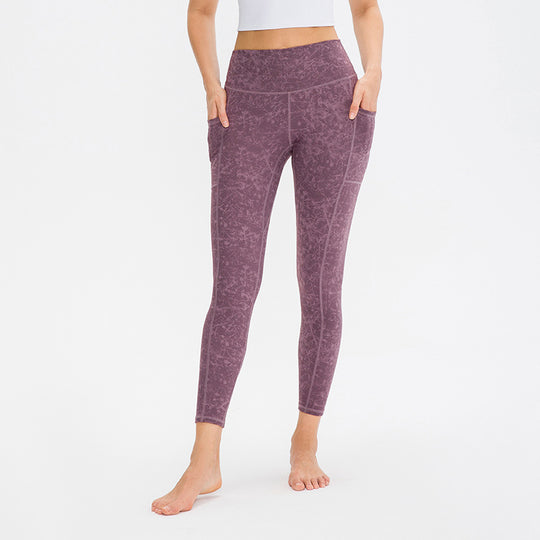 Damen Hochwertige Performance-Leggings mit praktischen Seitentaschen und elastischem Bund Heidi-Mode