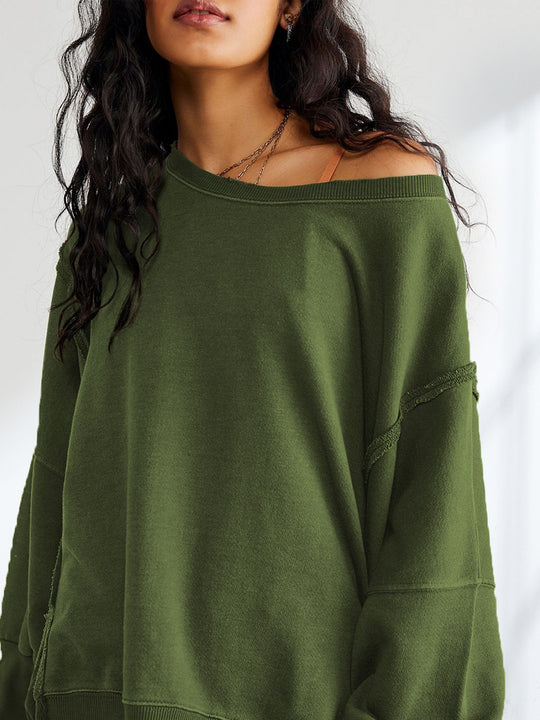 Damen Oversized Sweatshirt mit kreativem Saumdesign Heidi-Mode