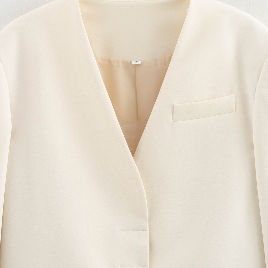 Damen elegante Bouclejacke mit zeitgemäßem Schnitt und integrierten Taschen Heidi-Mode