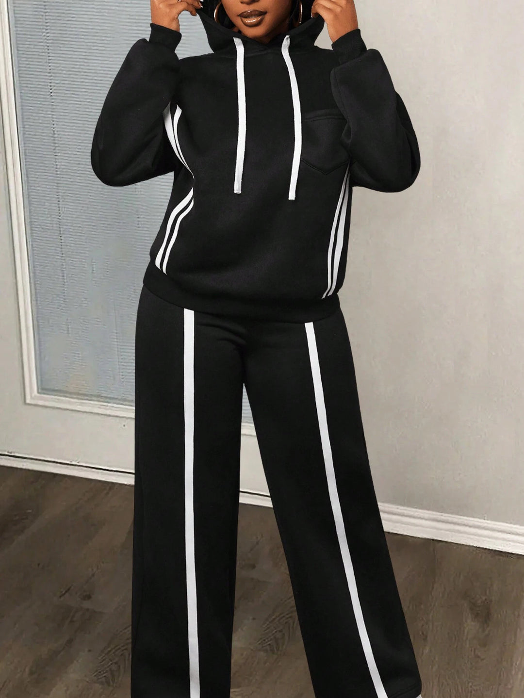 Damen sportliches Hoodie-Set mit weitem Schnitt und eleganten Streifen Heidi-Mode