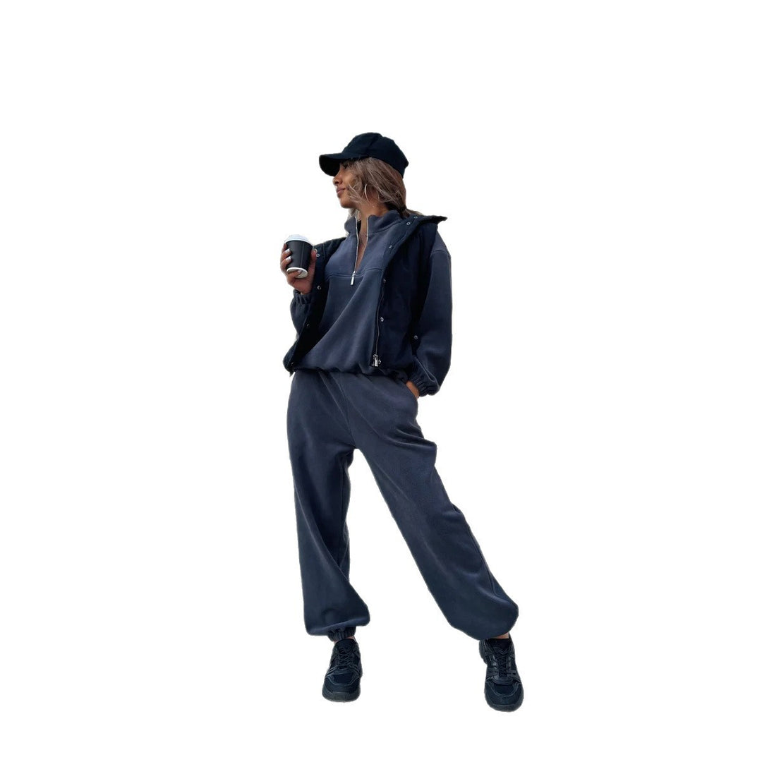 Damen sportliches Fleece-Jogginganzug mit halbem Reißverschluss und elastischen Bündchen Heidi-Mode