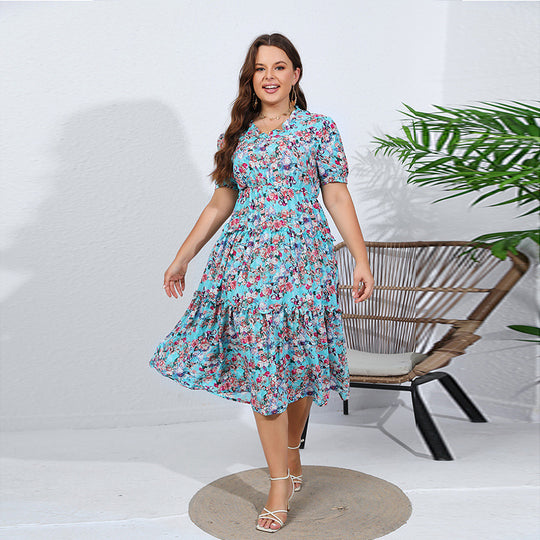 Damen Midikleid mit verspieltem Blütenmuster und voluminösem Rock Heidi-Mode