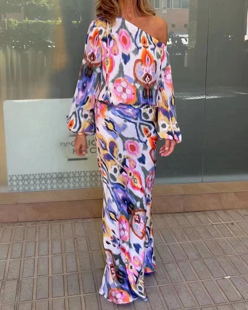 Damen Elegantes Maxikleid im grafischen Batikdesign mit Off-Shoulder-Ausschnitt und voluminösen Ärmeln Heidi-Mode