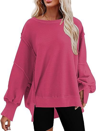 Damen Oversize Sweatshirt mit Ballonärmeln und seitlichen Schlitzen Heidi-Mode