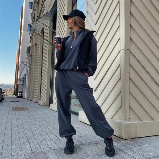 Damen sportliches Fleece-Jogginganzug mit halbem Reißverschluss und elastischen Bündchen Heidi-Mode