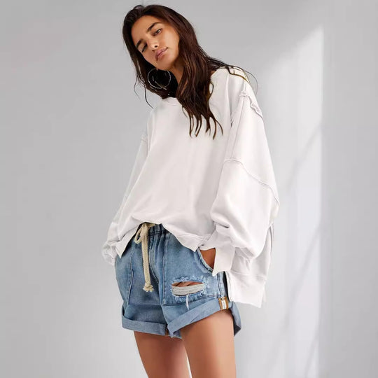Damen Oversized Sweatshirt mit kreativem Saumdesign Heidi-Mode