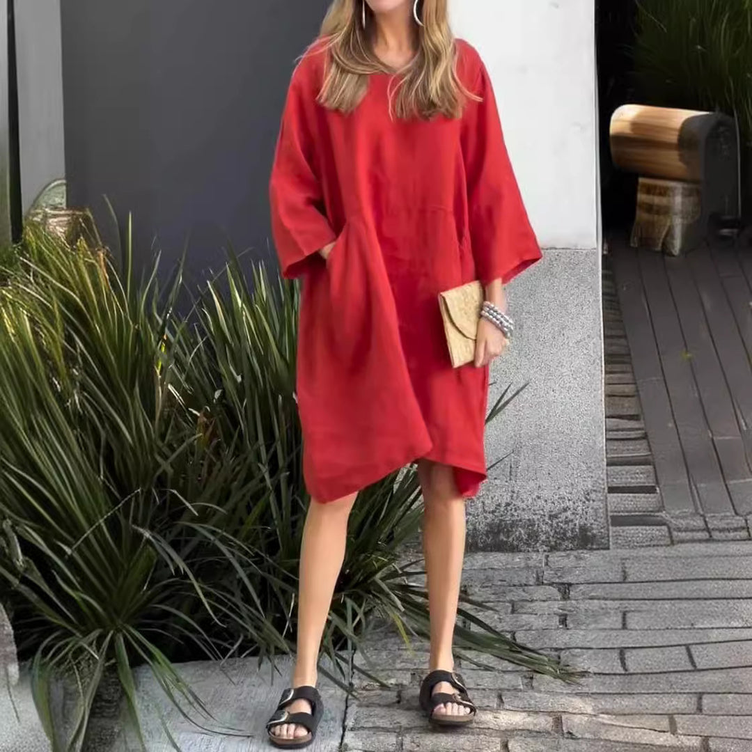 Damen lässiges Leinenkleid mit praktischen Taschen und asymmetrischem Saum Heidi-Mode