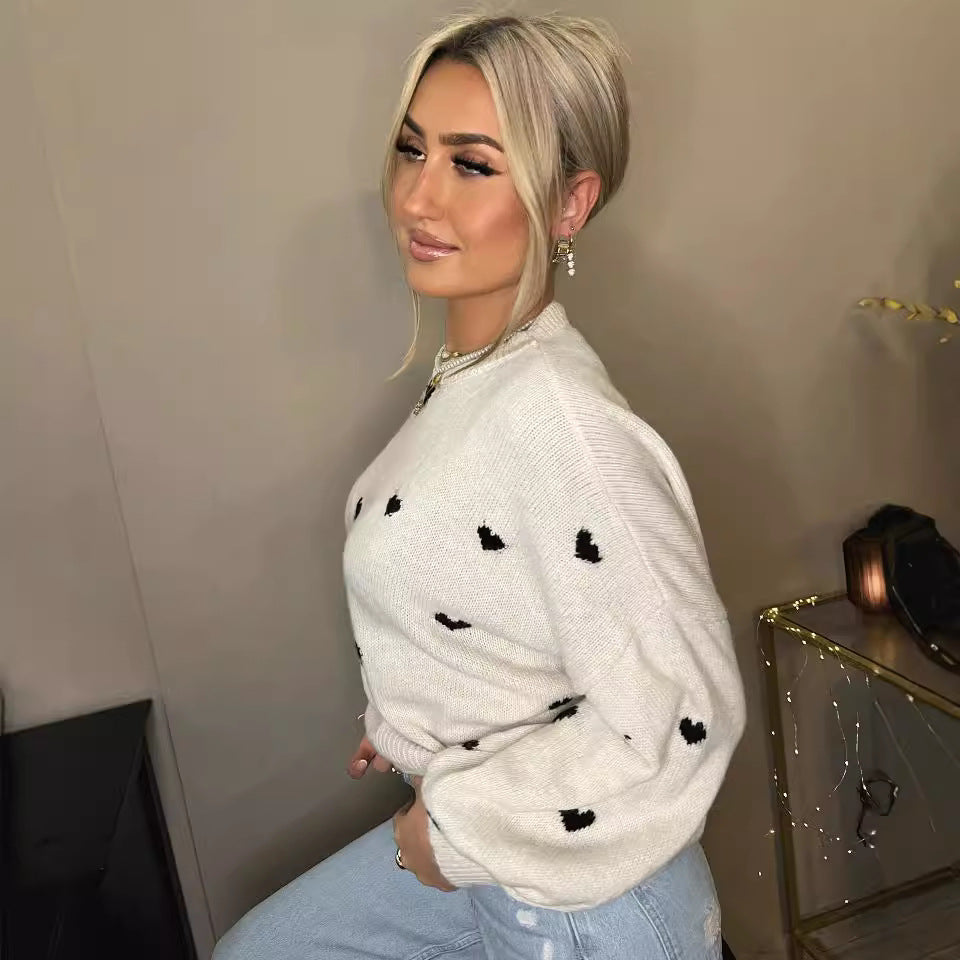 Damen lässiger Strickpullover mit herzförmigen Mustern und angeschnittenen Ärmeln Heidi-Mode
