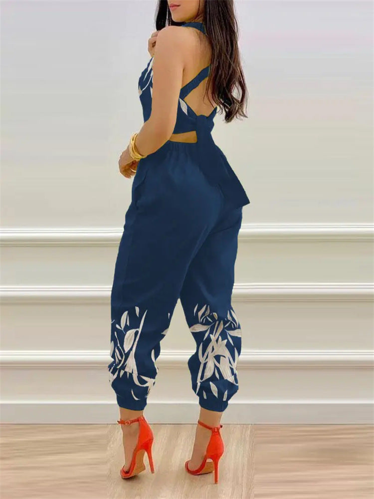 Damen eleganter Jumpsuit mit detailverliebtem Blättermotiv Heidi-Mode