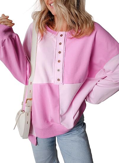Damen lässiger Kapuzenpullover mit Knopfdetails und Farbblockdesign Heidi-Mode