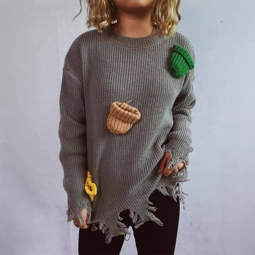 Damen lässiger Oversize-Pullover mit fransigen Details und bunten Applikationen Heidi-Mode