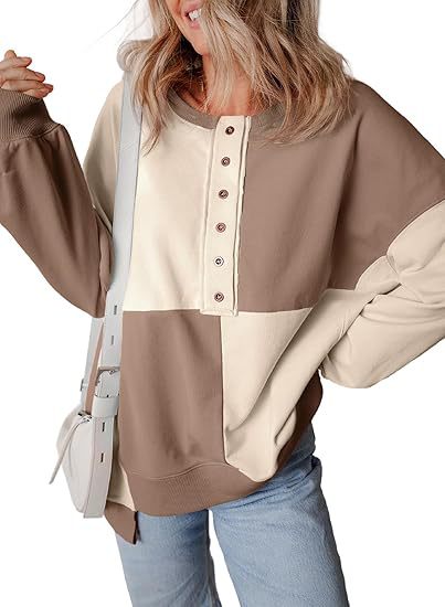 Damen lässiger Kapuzenpullover mit Knopfdetails und Farbblockdesign Heidi-Mode