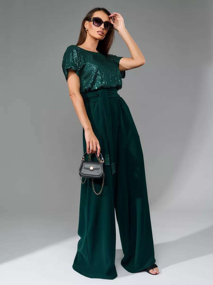 Damen Glitzernder Jumpsuit mit weitem Bein und Taillengürtel Heidi-Mode