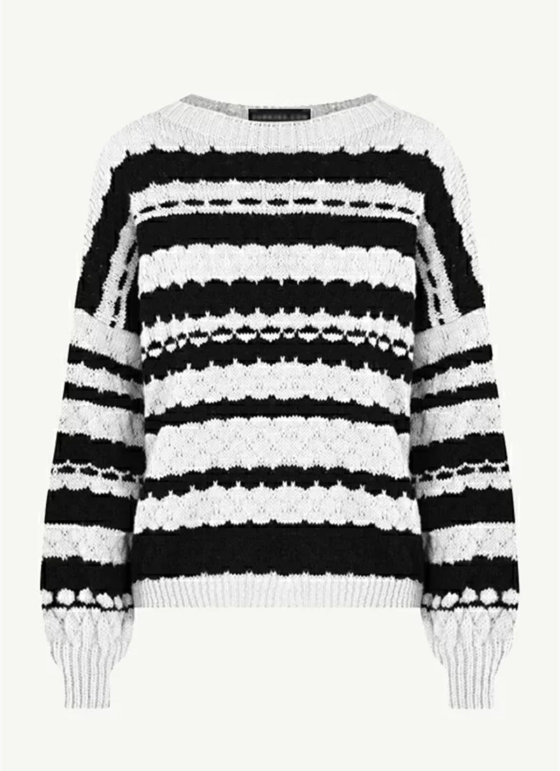 Damen gemütlicher Strickpullover mit modernem Zopfmuster und grafischen Akzenten Heidi-Mode