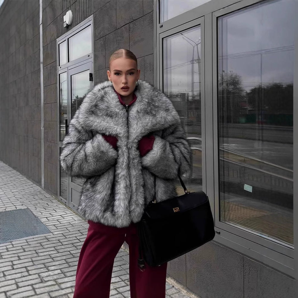 Damen elegante Kunstfelljacke mit voluminösem Kragen und verschließbaren Taschen Heidi-Mode