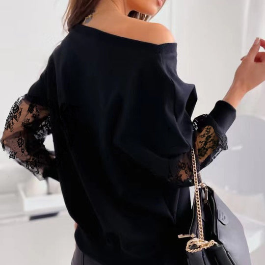 Damen eleganter Pullover mit transparenten Spitzenärmeln und asymmetrischem Ausschnitt Heidi-Mode