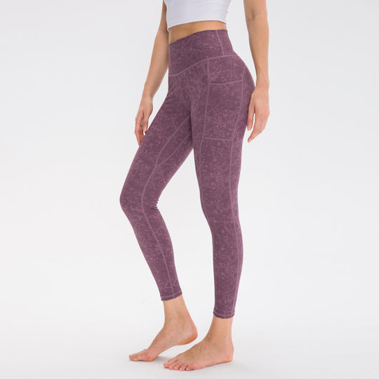 Damen Hochwertige Performance-Leggings mit praktischen Seitentaschen und elastischem Bund Heidi-Mode