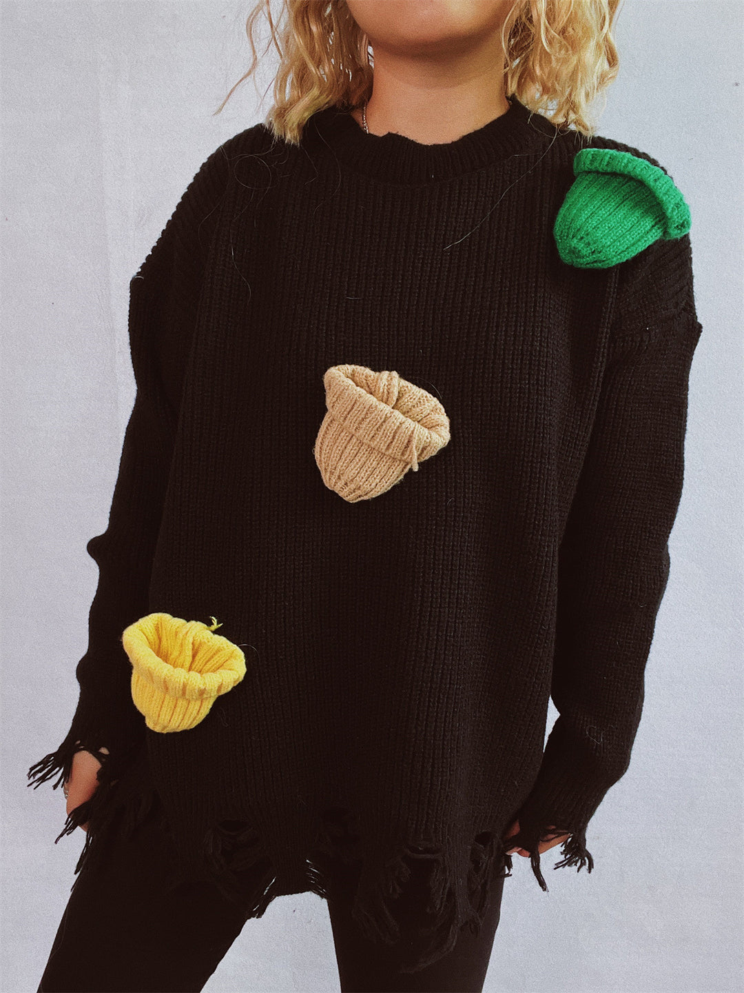 Damen lässiger Oversize-Pullover mit fransigen Details und bunten Applikationen Heidi-Mode