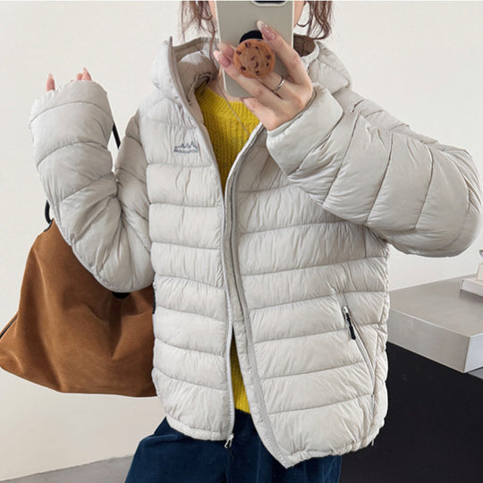 Damen ultraleichte Pufferjacke mit abnehmbarer Kapuze und elastischem Saum Heidi-Mode
