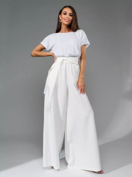 Damen Glitzernder Jumpsuit mit weitem Bein und Taillengürtel Heidi-Mode