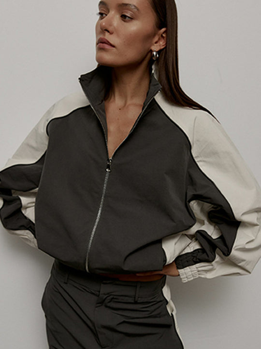 Damen sportliche Kapuzenjacke mit hohem Kragen und asymmetrischem Design Heidi-Mode