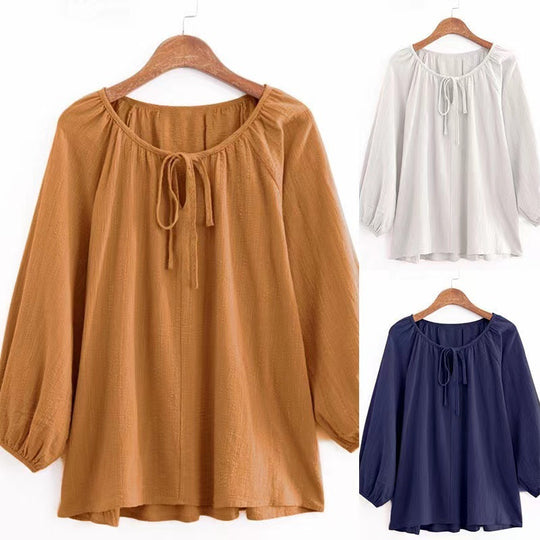 Damen Bluse mit elegantem Rundhalsausschnitt und knieumspielenden Puffärmeln Heidi-Mode