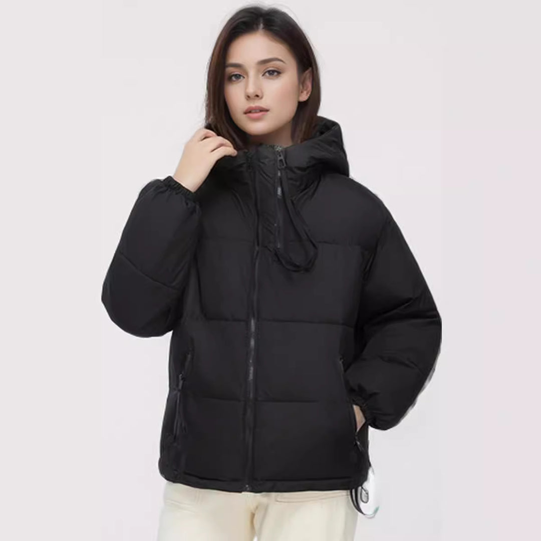 Damen wasserabweisende Winterjacke mit verstellbarer Kapuze und praktischen Taschen Heidi-Mode