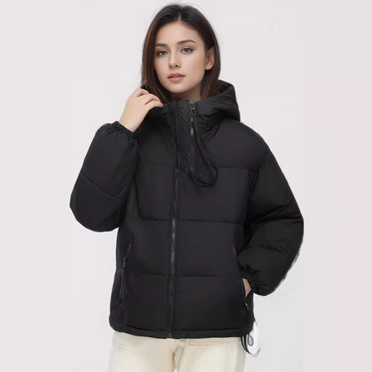 Damen wasserabweisende Winterjacke mit verstellbarer Kapuze und praktischen Taschen Heidi-Mode