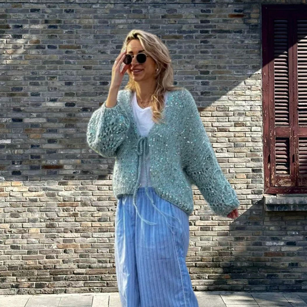 Damen Grobstrickjacke mit festlichem Knotendetail und weit geschnittenen Ärmeln Heidi-Mode