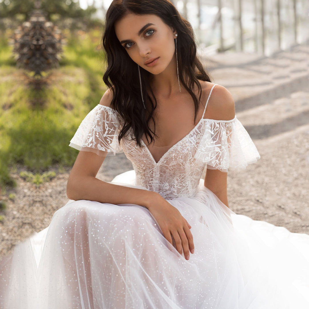Damen Elegantes Hochzeitskleid mit transparenten Puffärmeln und glitzerndem Oberteil Heidi-Mode