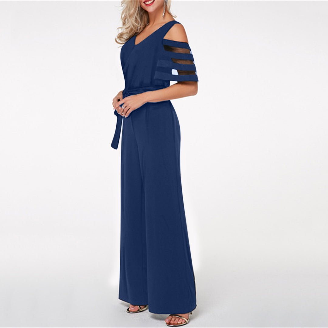 Damen Eleganter Jumpsuit mit transparenten Ärmel-Details und Taillengürtel Heidi-Mode