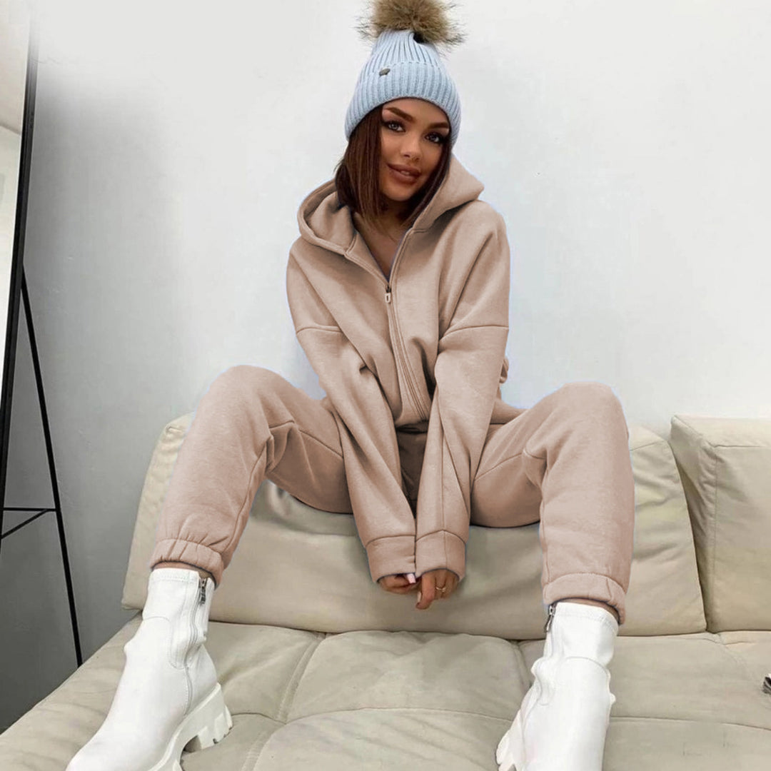 Damen Sportlicher Jumpsuit mit durchgehendem Reißverschluss und Kapuze Heidi-Mode